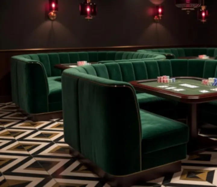 Casino lounge with emerald booths, bronze lighting and elegant table games